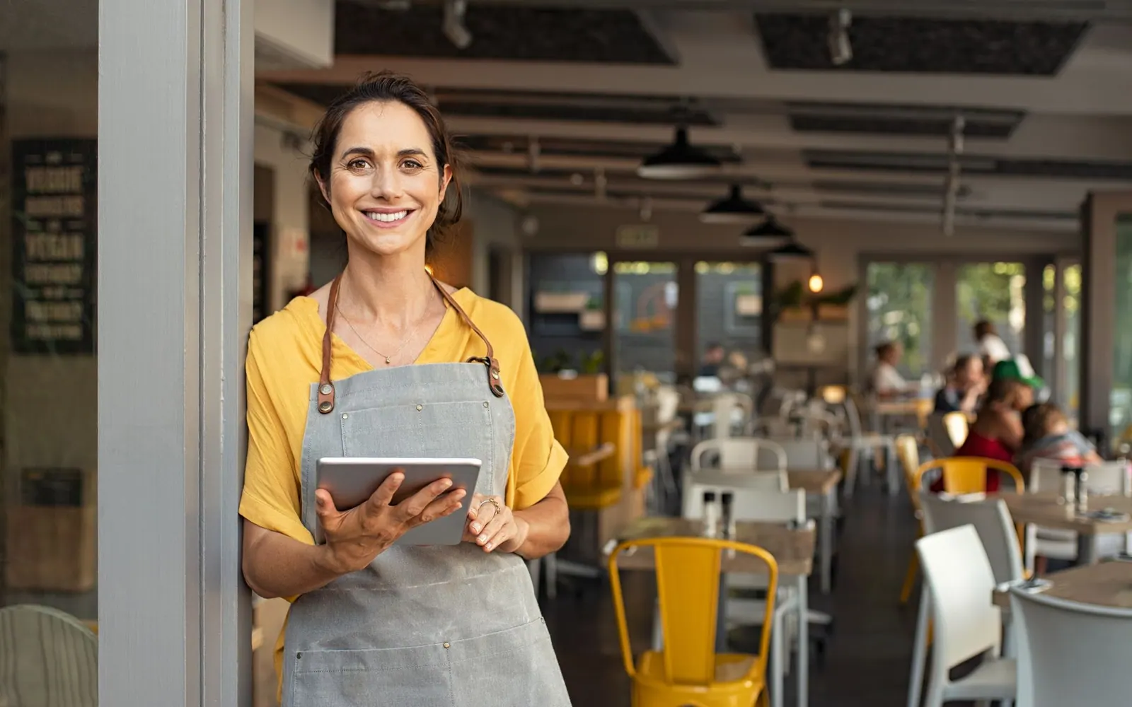 A small business owner at work in her shop